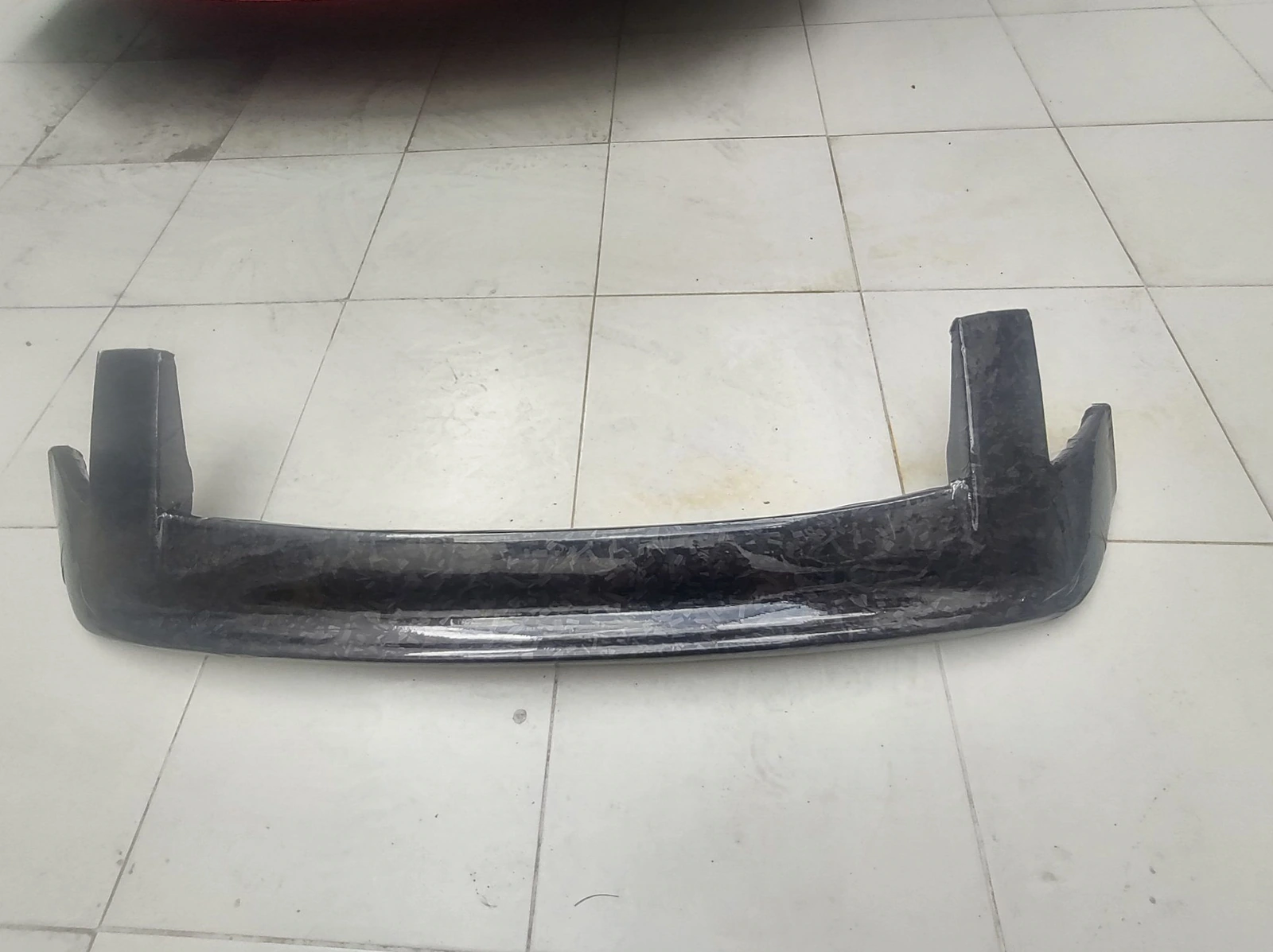 Aleron de fibra de vidrio forrado con fibra de carbono forjado vinil Av pantitlan y Sor Juana
