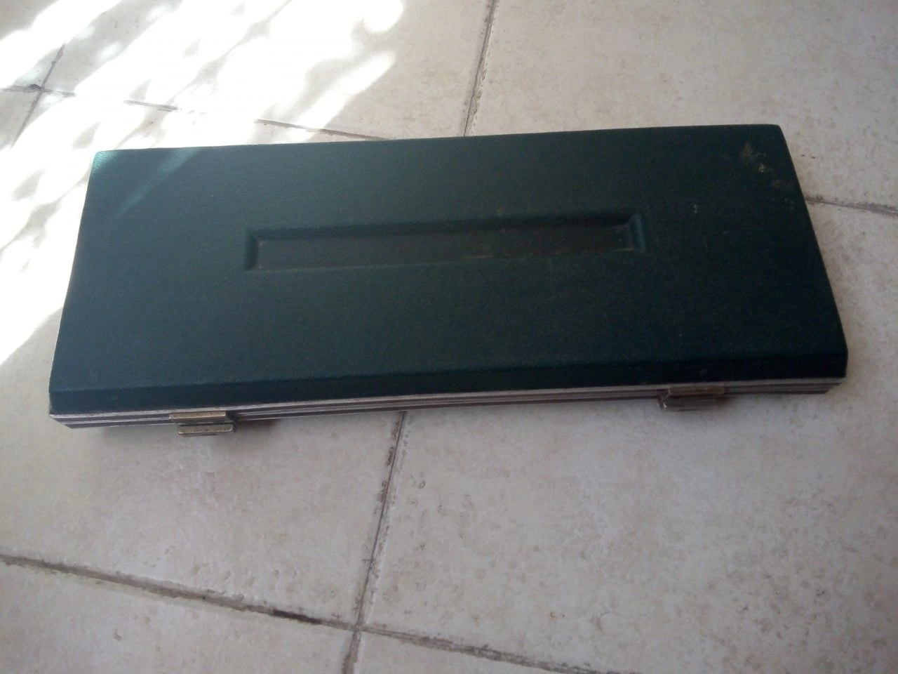 Estuche de rotulación original.