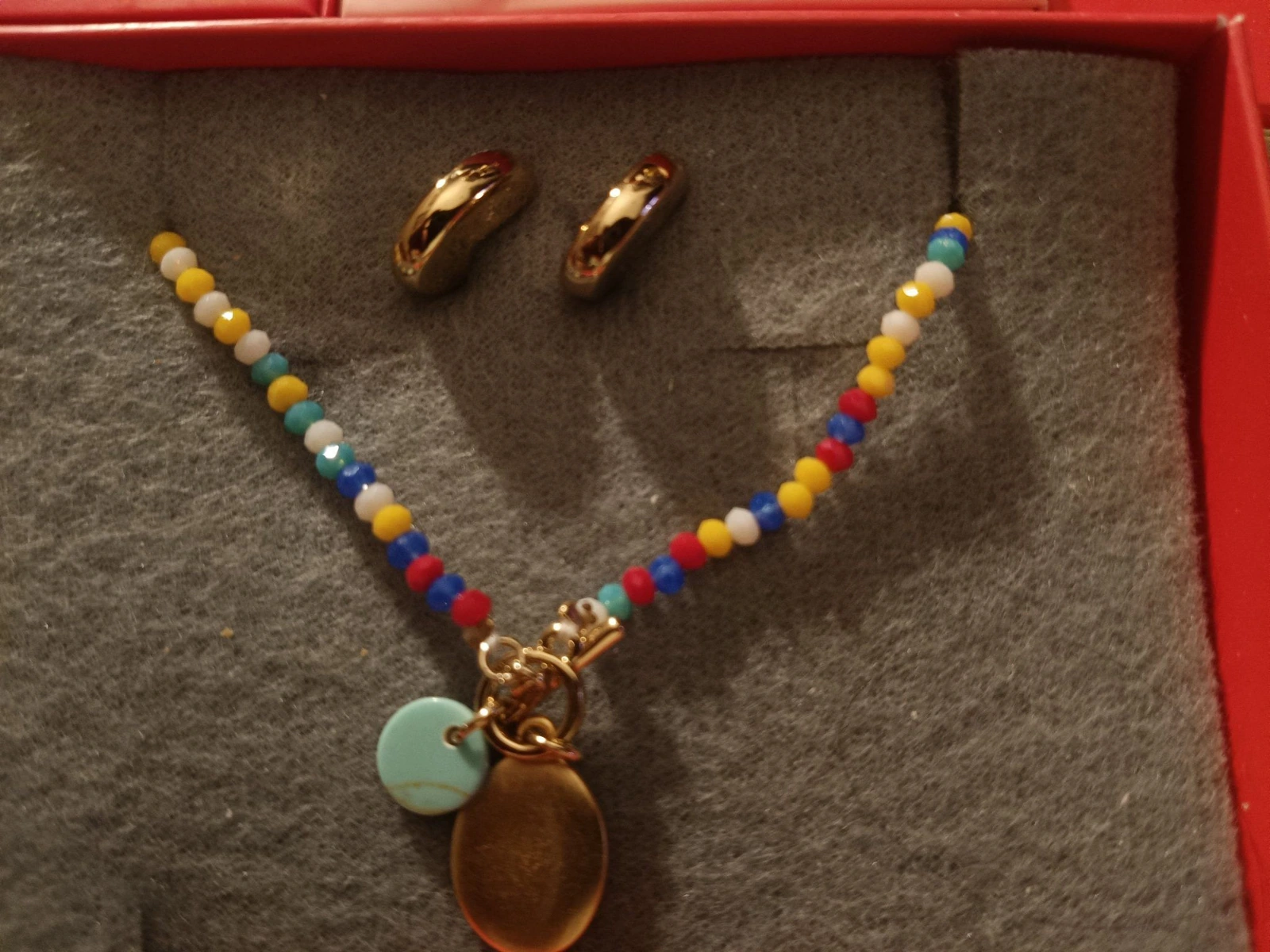 Collar y aretes prism