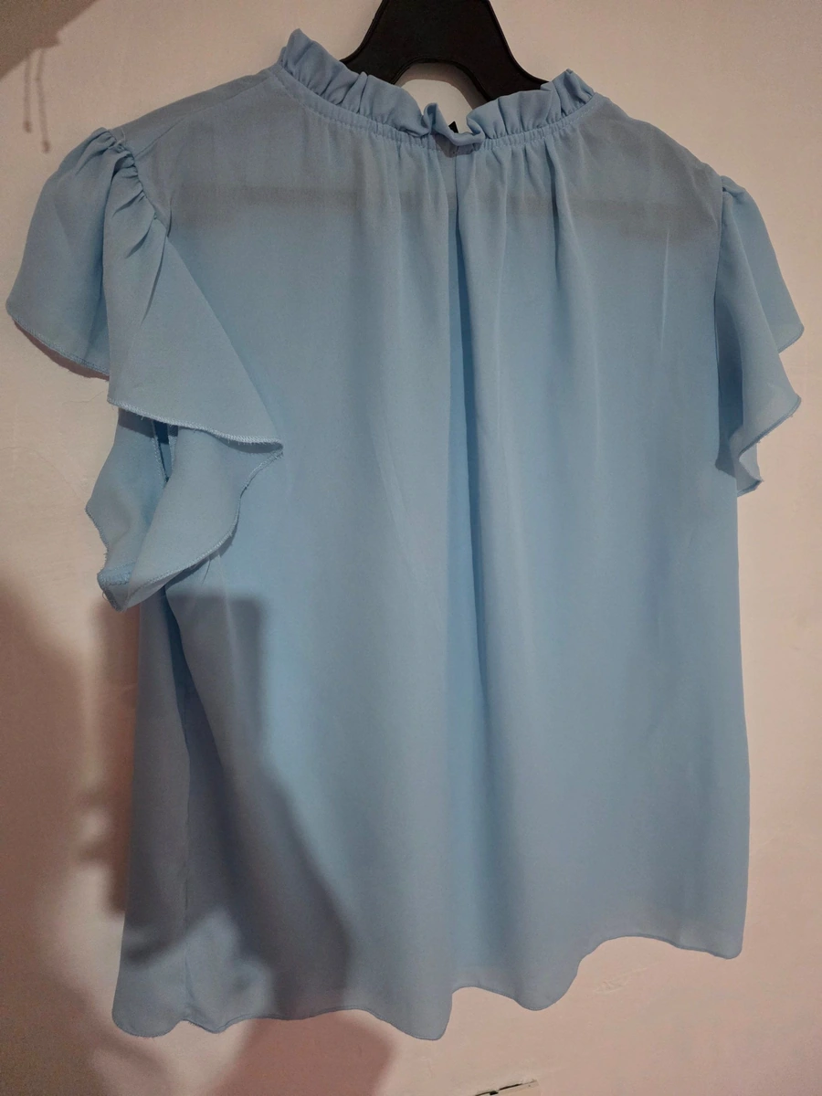 Blusa azul cielo
