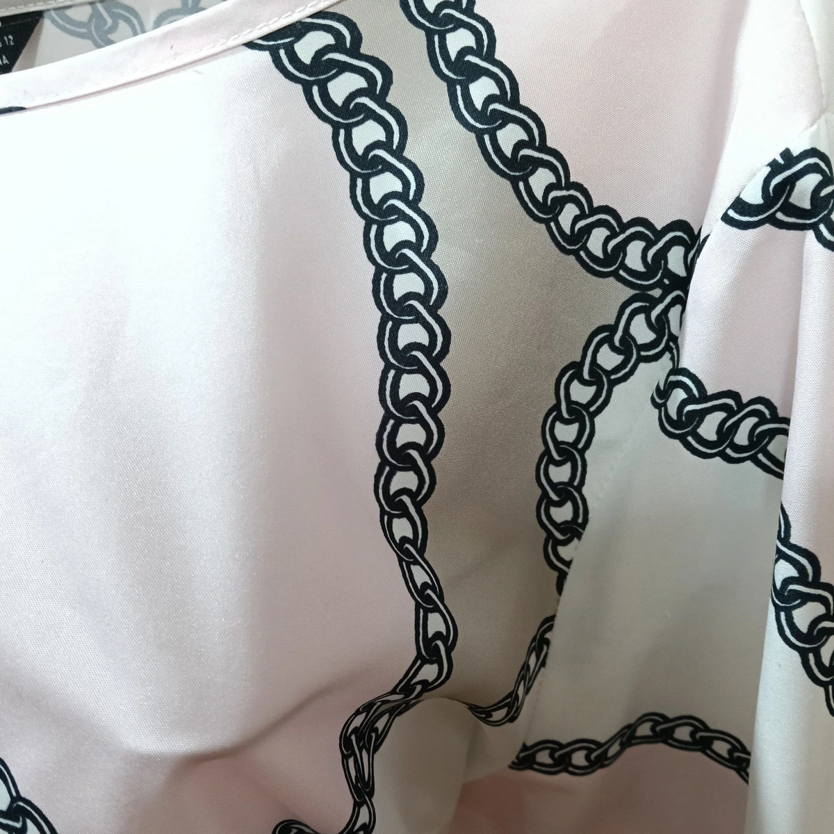 Blusa rosa y blanco